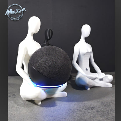 Support Alexa Echo Dot imprimé en 3D, figurine minimaliste assise en position du lotus. Design zen, moderne et personnalisable, fabriqué en France.
3D printed Echo Dot stand, minimalist figurine in lotus pose. Zen and modern design, customizable, handmade in France.