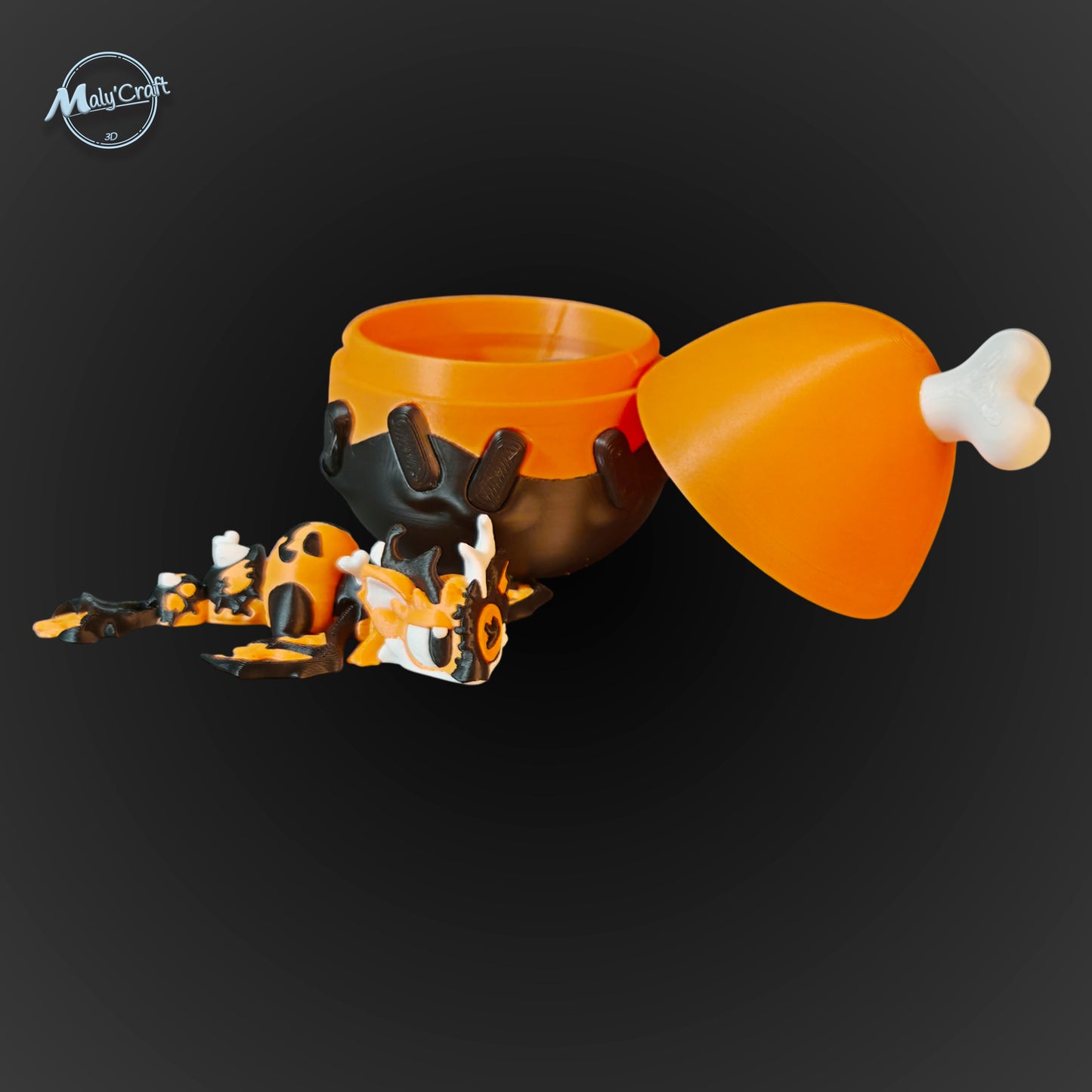 Petit dragon articulé orange et noir, figurine 3D articulée Halloween, décoration originale fabriquée en France.