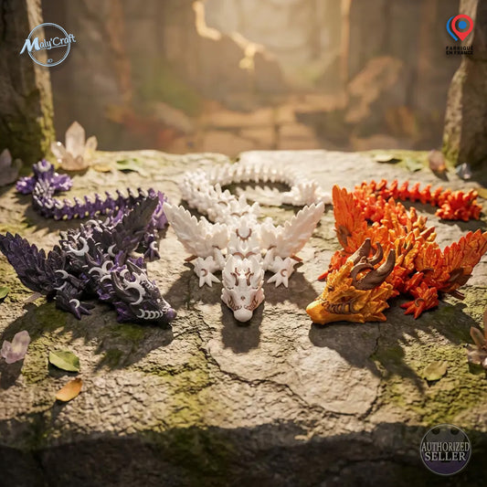 Mise en scène fantasy de dragons articulés Cinderwing avec cristaux. Figurines de collection bicolores imprimées en 3D. L'image affiche les badges de garantie : Fabriqué en France et Vendeur Autorisé Maly'Craft.