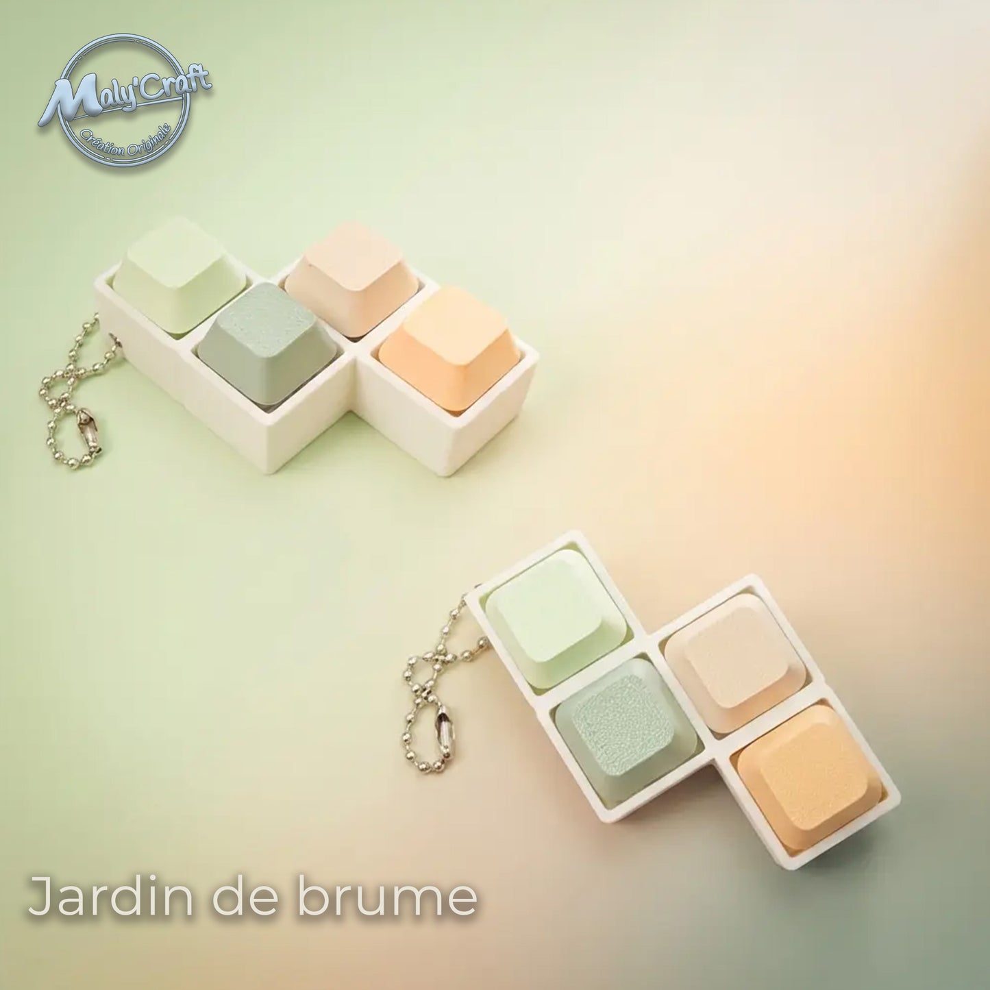 Porte-clé tactile Jardin de brume aux couleurs pastel vert et pêche, finition mat. Impression 3D réalisée dans mon atelier français avec filaments eSun. Design épuré en acide polylactique offrant un clic mécanique fluide et une esthétique douce